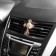 Decoration in a car deflector, cross