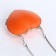 Female bag on a magnet, orange color