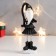 Polystone souvenir "High Santa Claus in black caftan, with a star" Long legs 15x5x4 cm