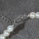 Set 2 objects: earrings, Antoinette necklace and a number of beads, white color in silver, 40 cm