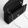 Female bag on a magnet, black color