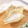 Candle "shell" in the candlestick of gypsum large, 17x11x5.5cm, gold