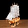 The ship souvenir medium "Ginder", board is light wood, white sails, 30x7x30 cm