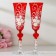 A set of wedding glasses "roses", with stucco and heart on a leg, red