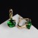 Earrings with bloom rhinestones, green color in gold