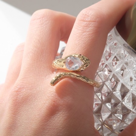 Ring "Snake" wriggling, white color in gold, dimensionless-1