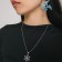 Earrings Metal "Japan" shurikens on the ring, the color of silver