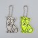 The reflective element "Corgi", bilateral, 4.3 × 5.5 cm, color mix