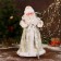 Santa Claus "in a white fur coat with gifts" moves, with backlight, 43 cm