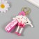 Trick rubber with a carbine, a “bunny” strap of arms and legs stretch out 2.7x6x7.8 cm