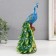 Polystone souvenir "Blue peacock with a green tail" 12.5x14x25 cm