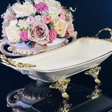 Dish with lenardi handles, on legs, porcelain, length 38 cm