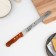 Biscuit knife bilateral “love”, 38 x 3 cm, blade 25 cm