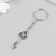 Metal keychain "Key with rhinestones" silver 1.5x1.6x4.2 cm