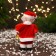 Santa Claus "with a candle and a gift/bell" 16 cm, mix