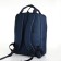 A backpack of textiles with a zipper, 3 pockets, a laptop, blue color