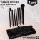 A set of makeup brushes, 7 objects, a cover on the ties, the color is black