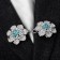 Cardigan clamp "Flower", blue color in silver