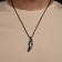 Pendant Male "Claw" pattern, color black silver on a black lace, 50 cm