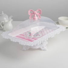 A dish for a cake and cakes with a lid 