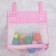 Grid for storing toys in the bathroom, pink color