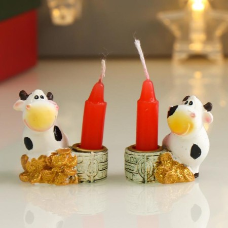 Souvenir Polystone SPRACTER with a candle "Bowing of a gland with coins" MIX 4.5x4.3x3 cm
