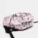 A backpack with a zipper, 3 outer pockets, pink/white color