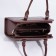 Women's bag El Masta with a zipper, outer pocket, long belt, coffee color