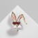 Brooch "Hare" with glasses, the color is pink-white in gold
