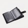 Male purse on the button, a department for car documents and passports, black color