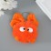 Fluffy on the ring "Masya with a large bow" Orange 12x8x8 cm