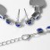 Set 4 objects: earrings, necklaces, bracelet, “heart” ring in circles, blue color in silver