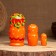 Matryoshka "Strawberry", orange dress, 3 puppet, 10-12 cm
