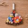 Brumber amulet, married couple, mix 25x25x2 cm
