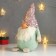 Interior doll "Santa Claus in a pink cap with sequins" 33x14x17 cm