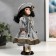 Doll Collectible Ceramics "Valya in a striped dress and knitted vest" 30 cm