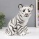The piggy bank "Tiger white" height is 23.5 cm, width 16 cm, length 23 cm.