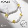 The necklace "Pearl beads" emoticons, yellow-white color, 40 cm