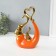 Souvenir ceramics "Elephants with heart. Abstraction" Orange with gold 7x18.5x25.5 cm