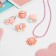 Set of children's “chosen” 5 objects: pendant, 4 rings, fantasy, shape mix, pink color