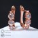 Earrings with rhinestones "Magic" path, trio, white color in pink gold