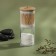 Organizer for storing cotton sticks and disks "Bamboo", with a lid, 2 removable sections, 7 × 18.5 cm, in a cardboard box, a transparent color