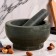 A mortar with a pestle made of stone is large, 1000 ml, black, in the box