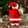 Santa Claus "in a patterned vest, with gifts" moves, with a backlight, 24 cm, red