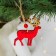 New Year's suspension "Golden Deer", red color