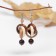 Handmade earrings, wooden "shells", white color