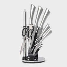 A set of kitchen knives on the ardone stand, 7 objects: 5 knives, musat and scissors, chrome color