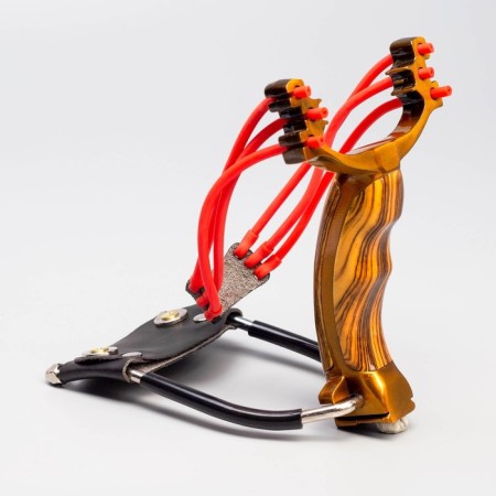 A slingshot with a plastic handle, with an emphasis-5