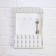 The keybox is “white”, 22.5 x 30.5 x 5.7 cm.