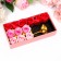 Soap roses of colored shades and a gold rose, set